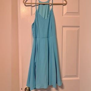 Light blue express dress.  Fitted to waist then flowy, high back